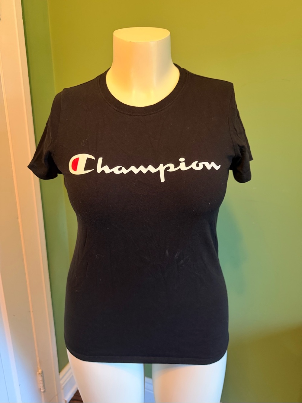 Champion Black Tee with White Script Logo and Red Accent